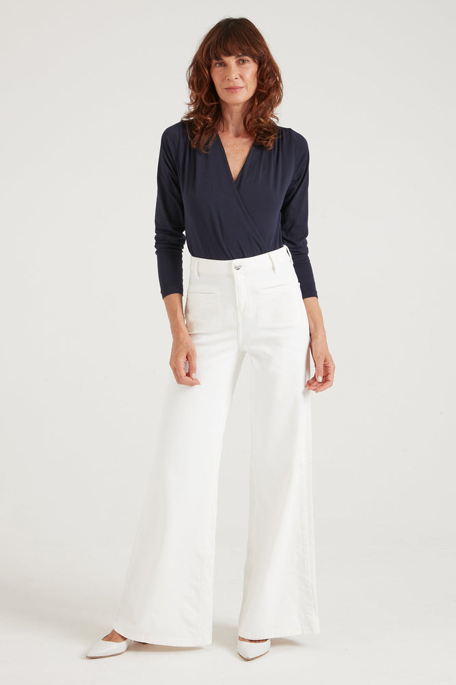 Joan The High Waisted Patch Pocket 70's Flare in Milk